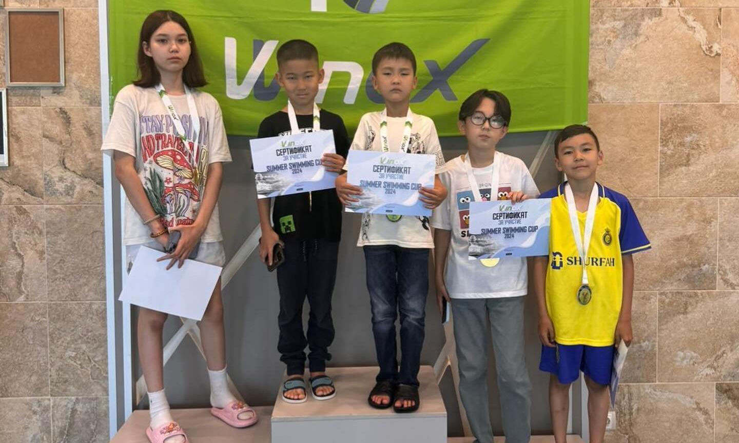 Юные спортсмены из Дворца единоборств имени Жаксылыка Ушкемпирова приняли участие в турнире по плаванию  «Summer Swimming Cup» среди детей